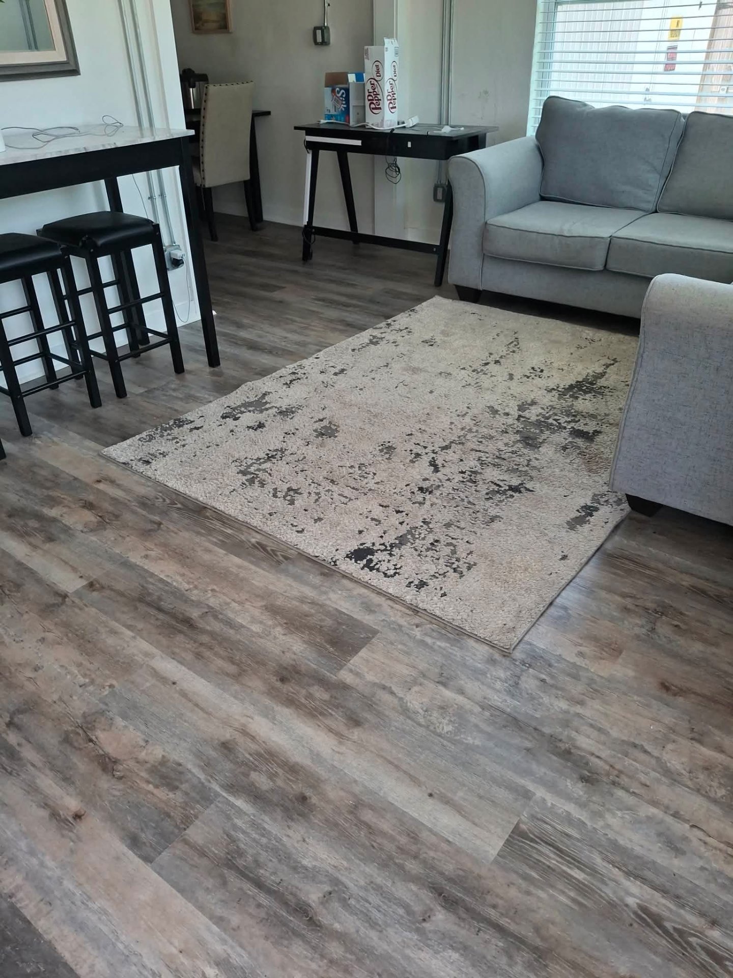 Finished plank flooring in a living area