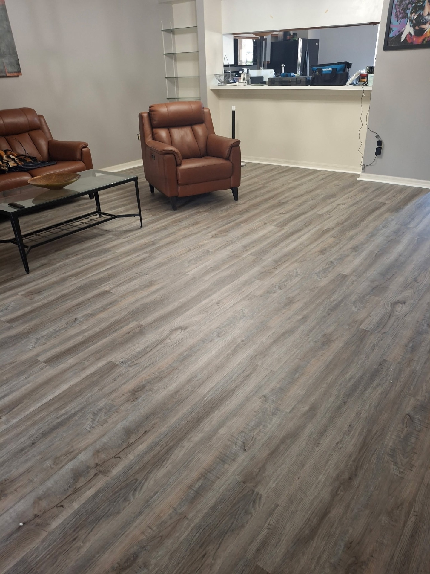 Finished plank flooring in a living room